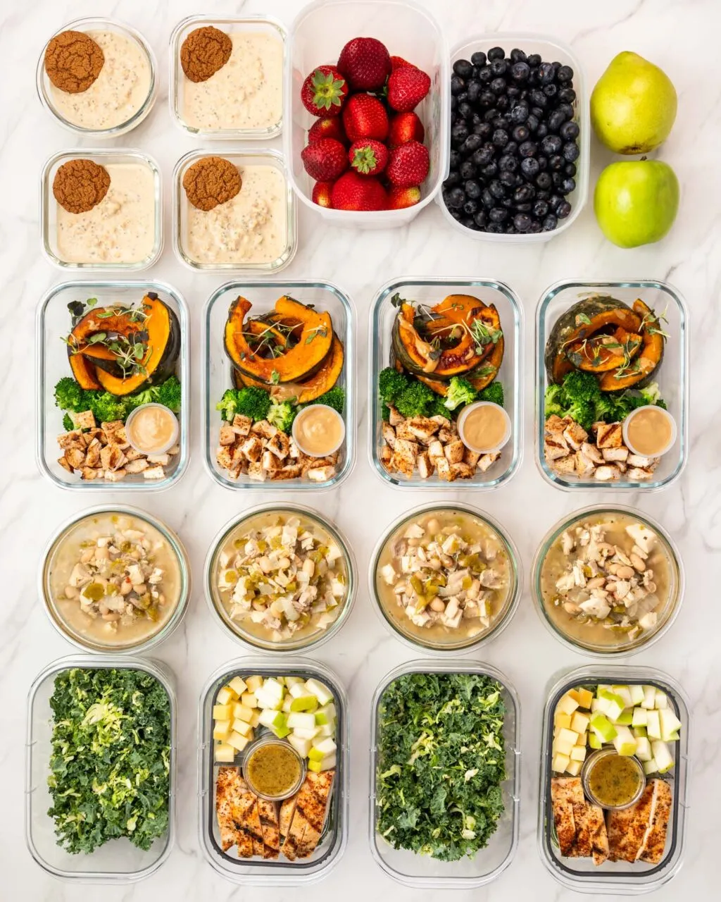 Roasted vegetables cooling beside labeled containers